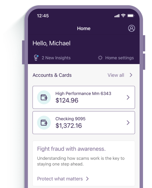 A person using the Truist mobile banking app on their smartphone to deposit a check